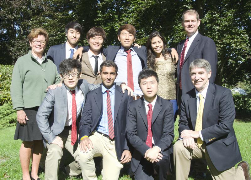 Senior international students spoke to their Tabor peers at an annual assembly, which included reflections on their time at the academy and music. Front row (l-r): Sunny Luo, Ahmed Bardooli, Roger Tam and Director of International Students Steve DownesBack row (l-r): Director of Communications Merry Conway, Kijun Song, Justin Lee, Steve Yi and Head of School John Quirk BY GEORGIA SPARLING